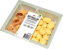 Köttbullar och kokt kulpotatis med gräddsås