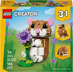 Söt hamster med blomma